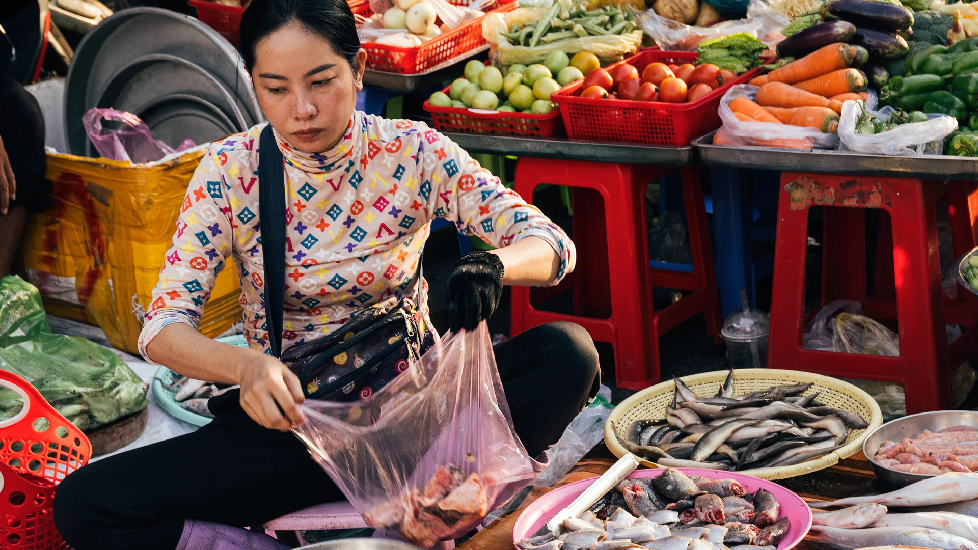 Fish seller in a Food tour Phnom Penh