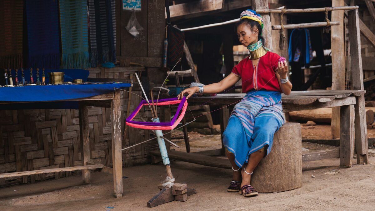 Ma Pang - Kayan Woman working with her loom in huay pu ken thailand