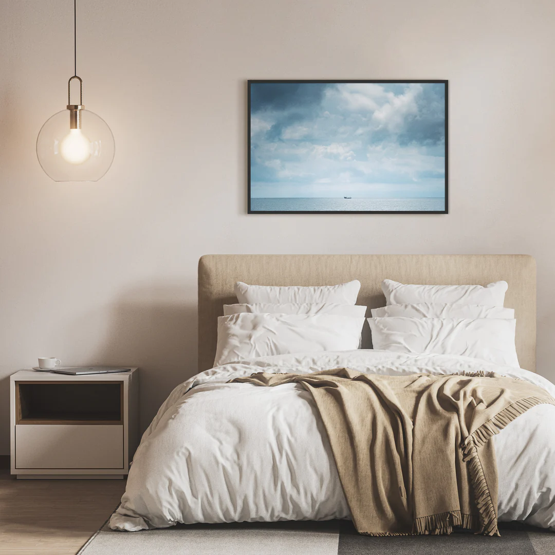 Home decor, print on fine art paper, view of the sea framed on top of a bed