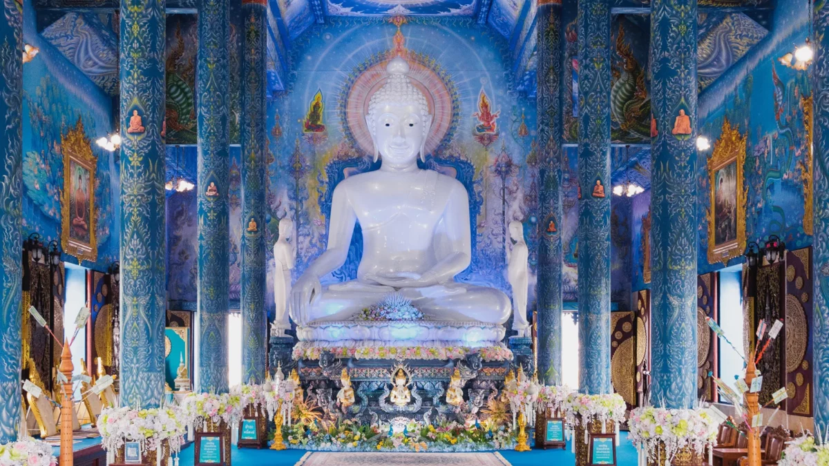 White Buddha inside of Wat Rong Suea Ten aka blue temple, Chiang Rai, Thailand
