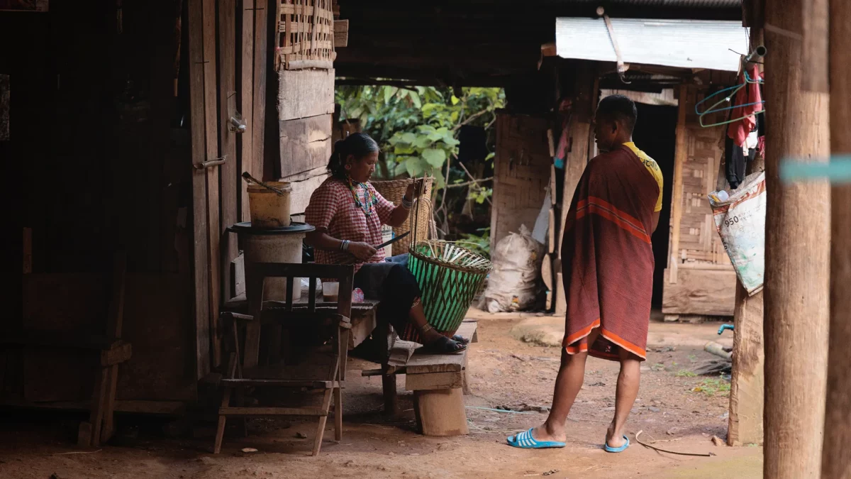 Karen woman making a traditional basket in a small village close to Mae Hong Son, Thailand