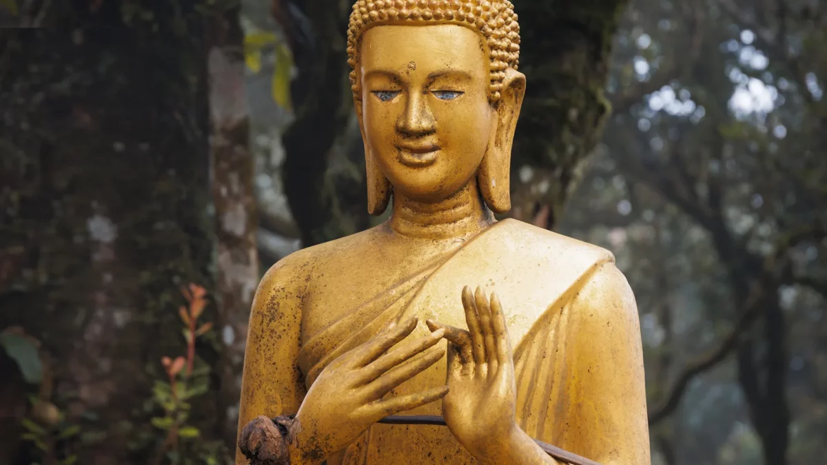 Golden buddha in the garden of Wat Sampov Pram bokor national park Kampot cambodia