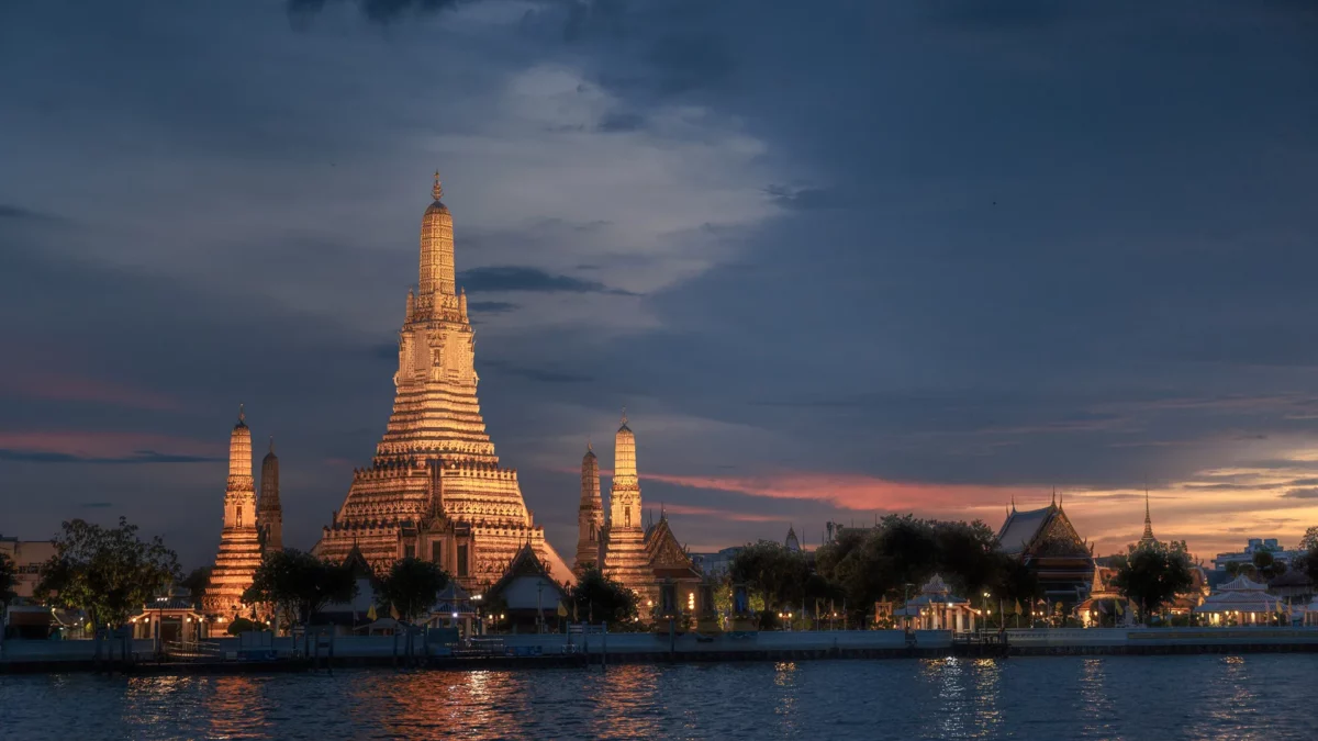 Wat Arun at sunset from the other side of the river, bangkok, thailand Wat Arun Ratchawararam Ratchawaramahawihan