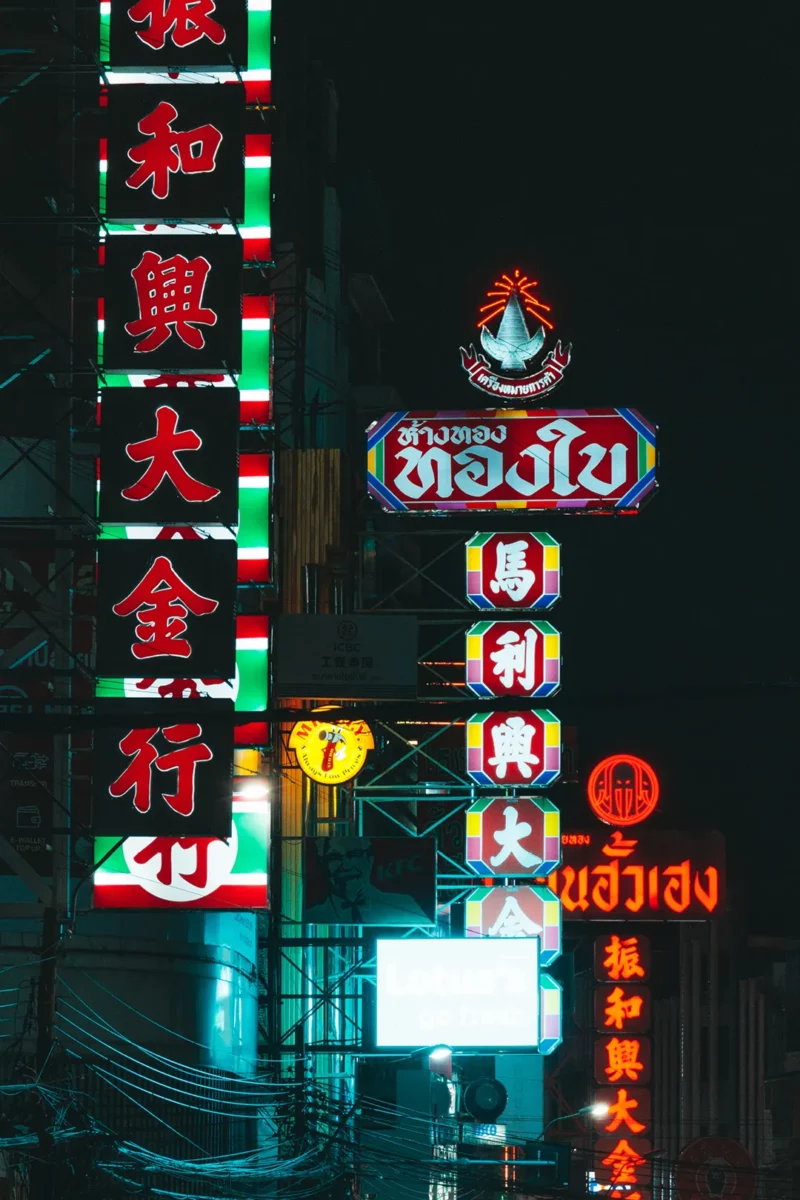 Neon street light detail of the colorful china town of Bangkok