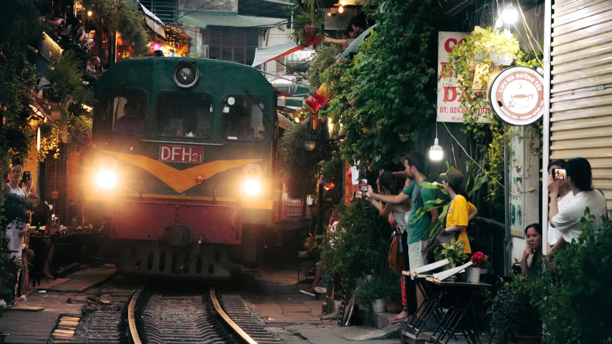 Train arriving in train street in Hanoi, Vietnam