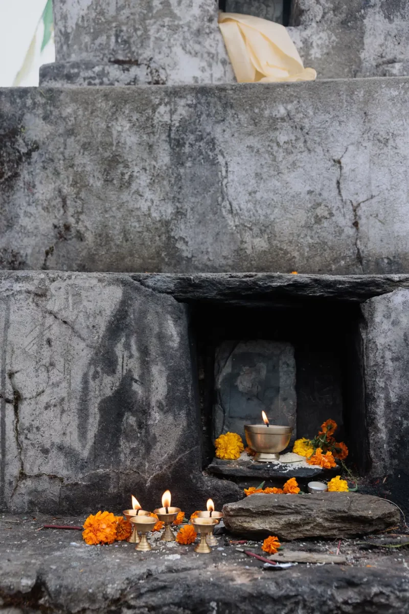 Offering and candle at the top of sailung stupa, Nepal