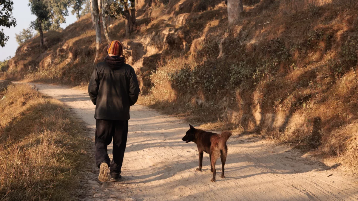 A break from the Thangka Mandala school with Livio, and the dog that adopted us