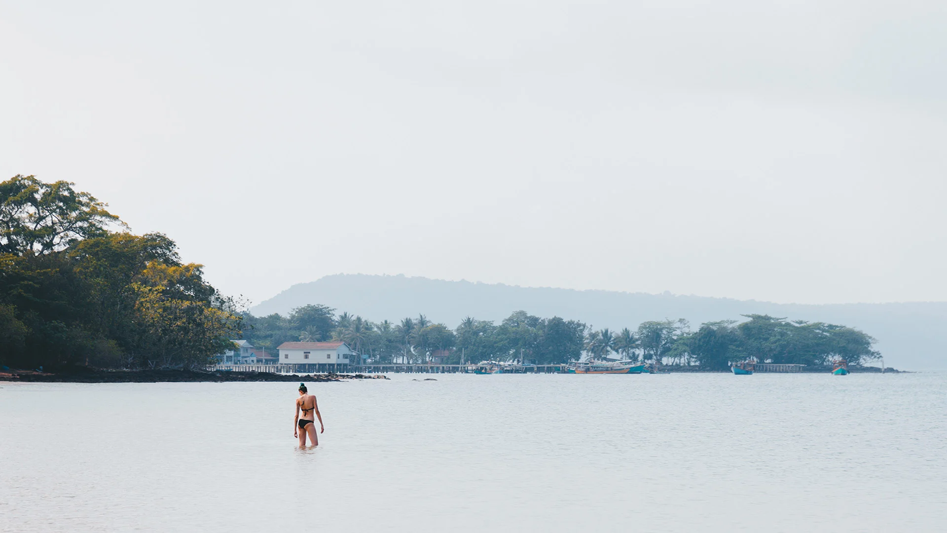 Girl bathing on long beach in Koh Rong Sanloem