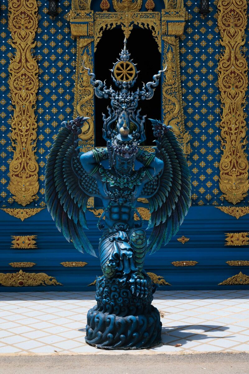 Winged monster in Wat Rong Suea Ten aka blue temple, Chiang Rai, Thailand