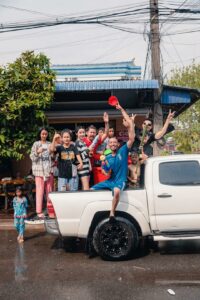 Suv filled with friends during cambodian new year in kampot
