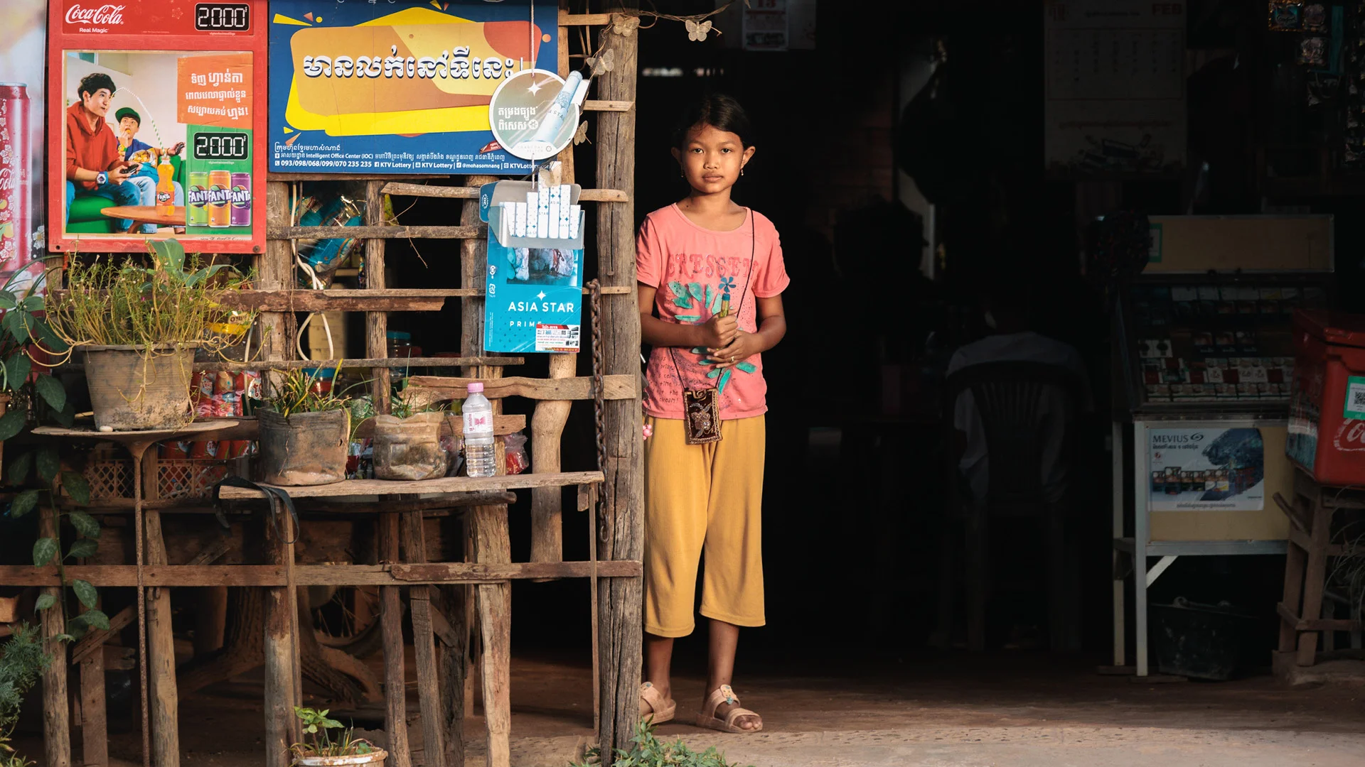 Girl in front of a shop in Siem reap cambodia