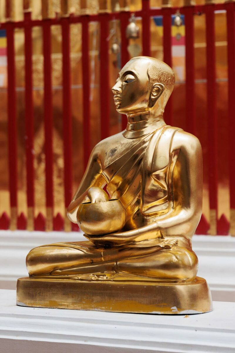 Golden monk food alms - Wat Phrathat Doi Suthep - Chiang Mai - Thailand