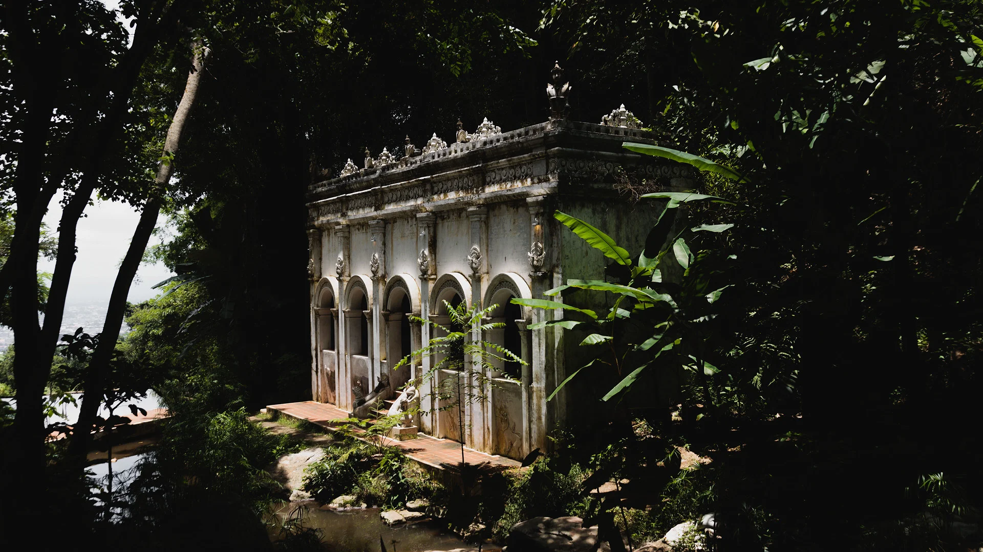 Wat Pha Lat white building in the forest - Chiang Mai - Thailand