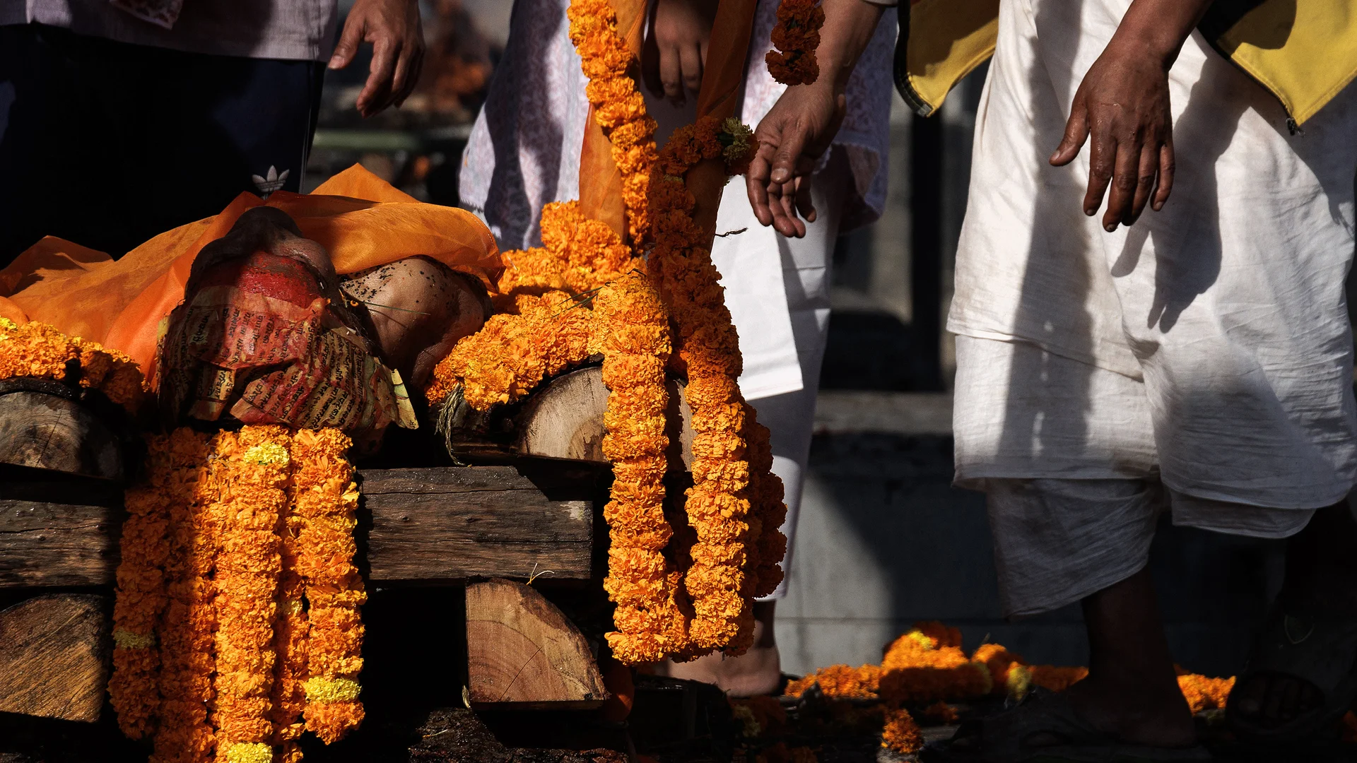 Women body right before the beginning of the cremation in Pashupatinath temple Nepal