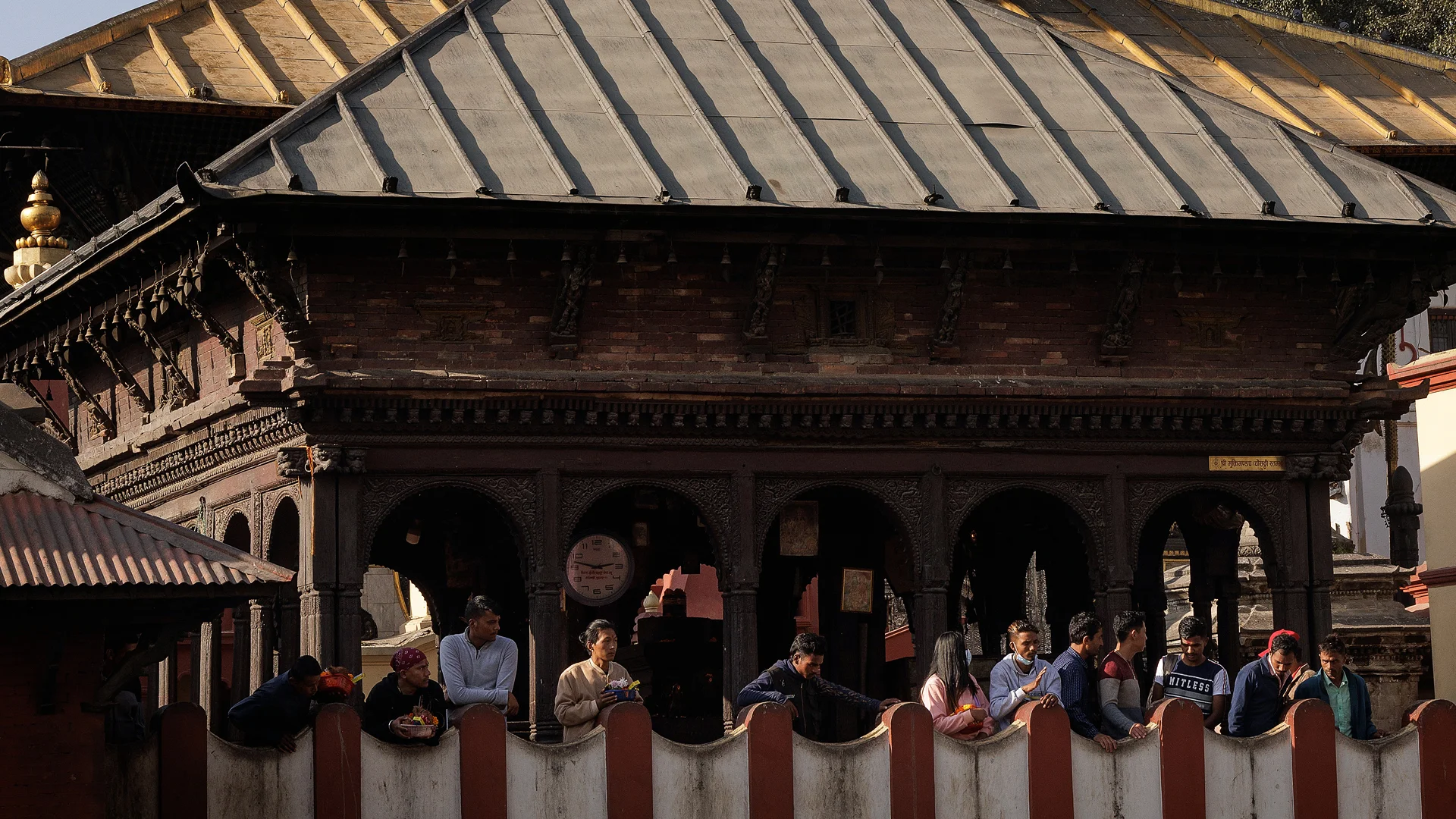 visitor at he balcony of Pashupatinath temple Nepal