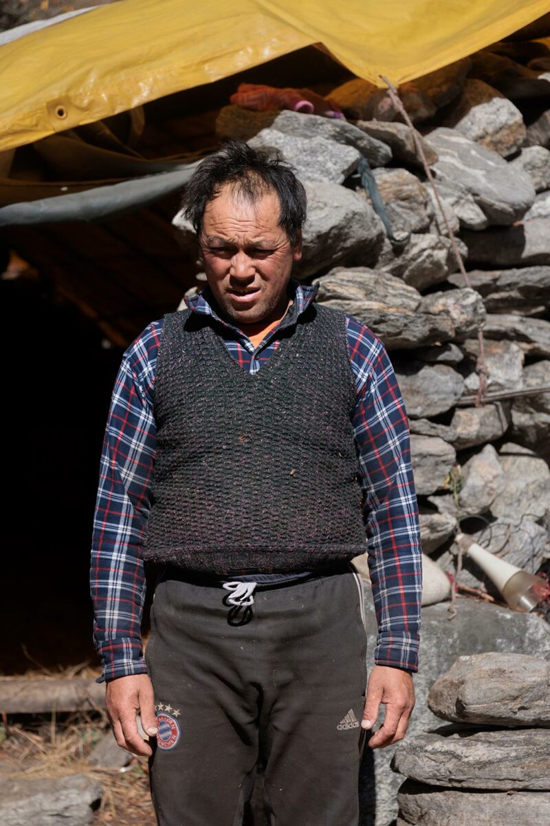 Yak herder Passang Tamang in front of his house Langtang Valley, Nepal