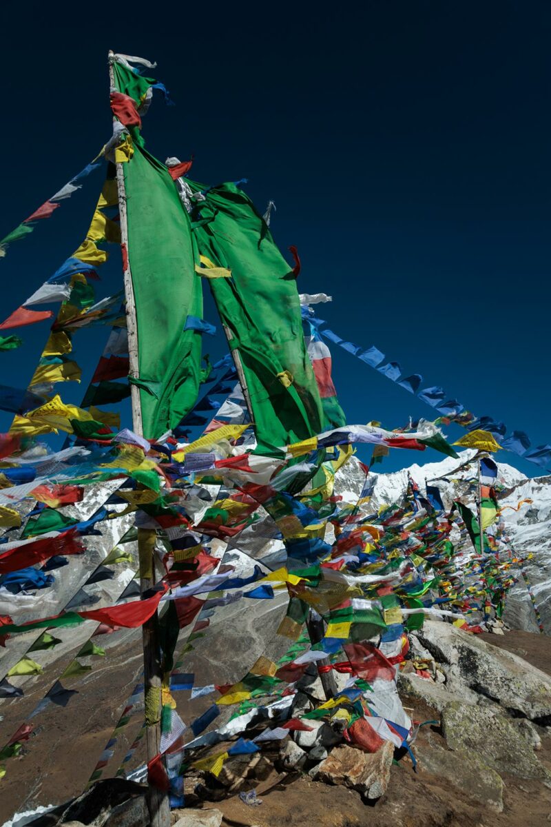 Tibetan prayer flag at the top of Tserko Ri, Langtang Nepal