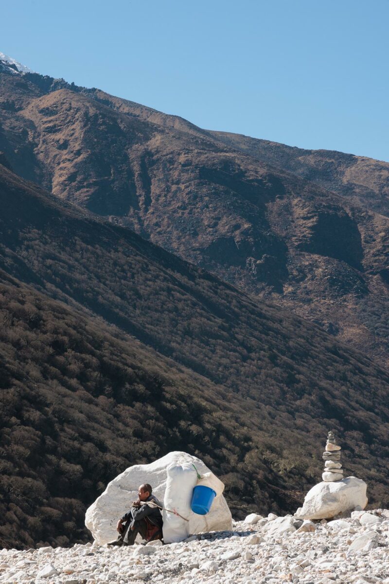 Sherpa resting in the land slide close to langtang Valley