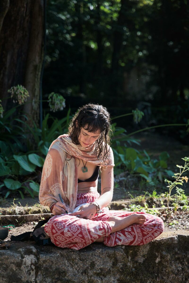 woman journaling ponte di lima the gathering of tribe