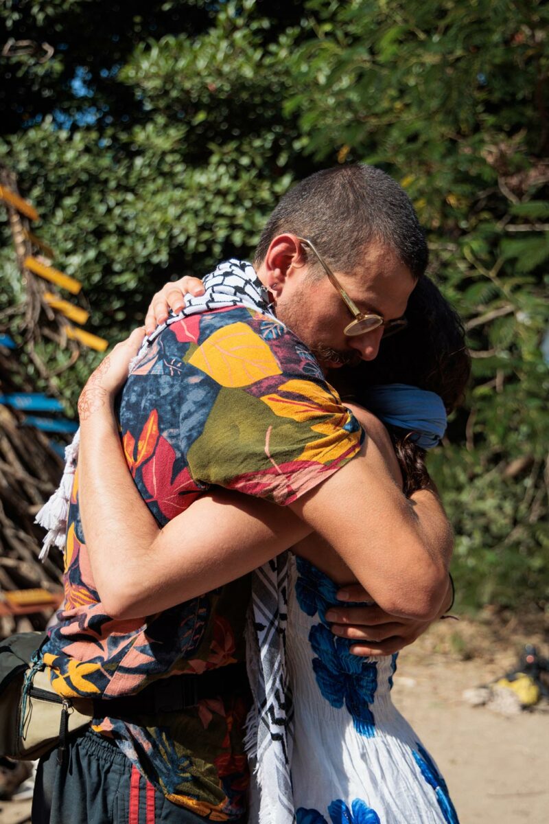 Hug at a regenerative festival