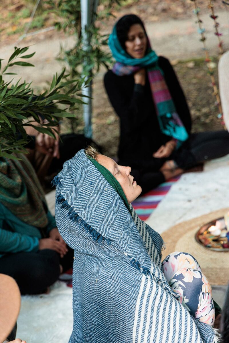 Morning circle, young women meditating