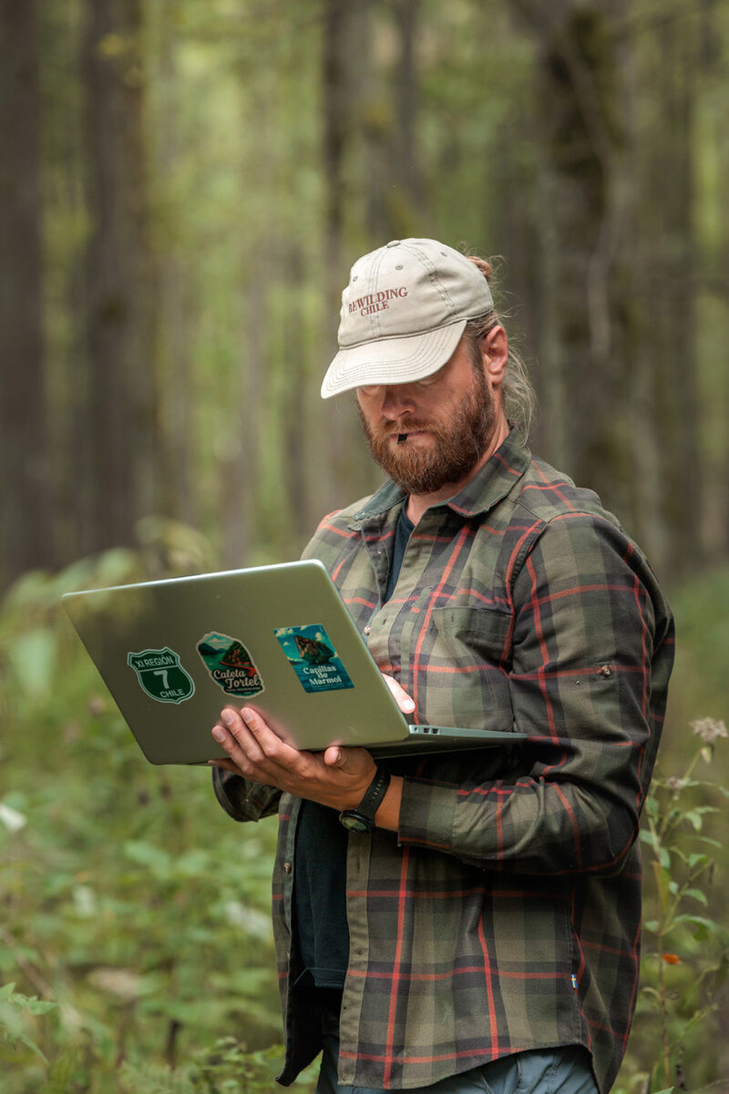 Łukasz Długowski of Totem Expedition - checking film footage in Białowieża forest in the Podlasie region