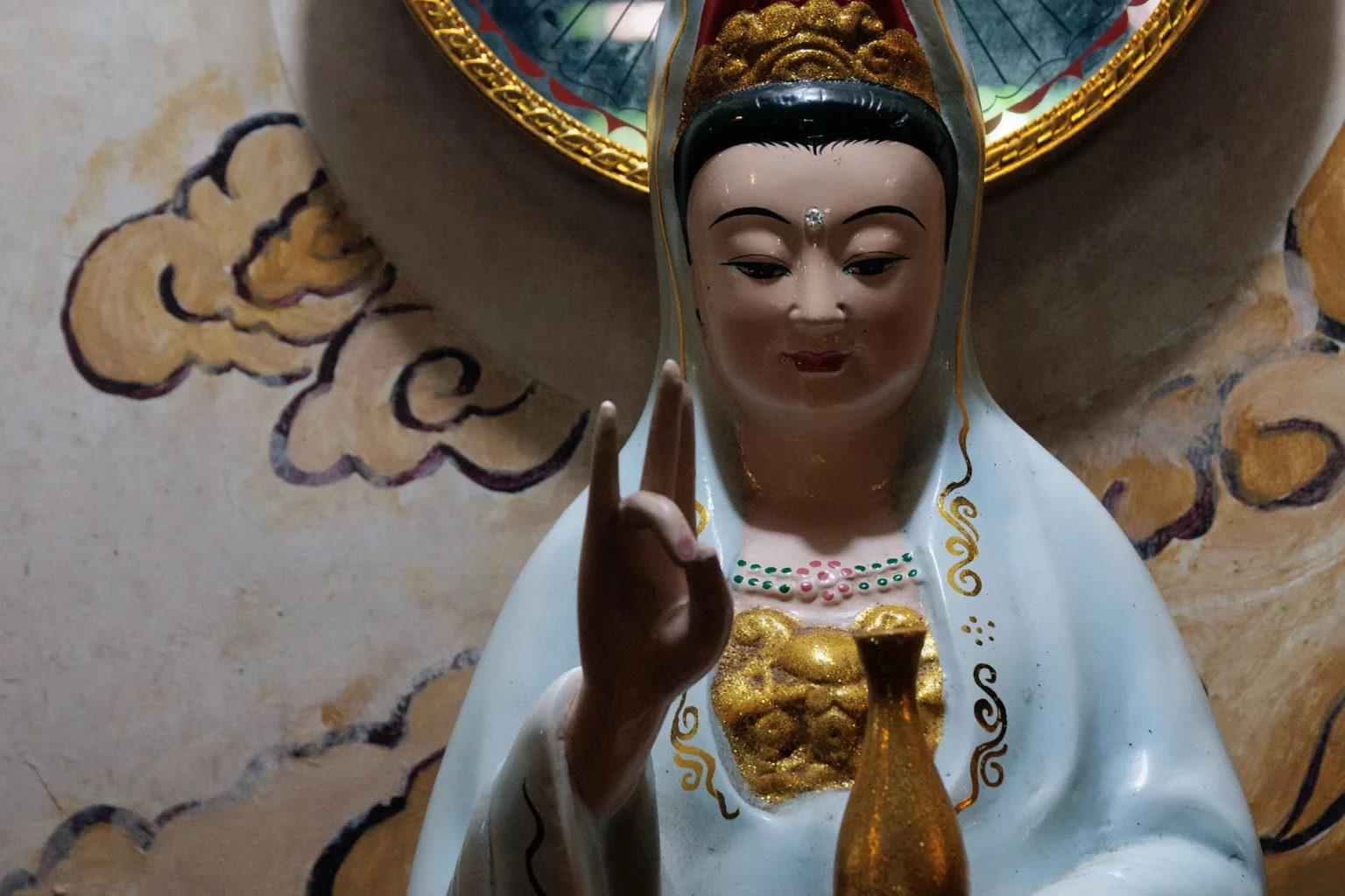 Statue of Guan Yin in an old temple in the unesco city of Hoi An, Vietnam